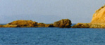 'Turtle' rock seen from Sarakiniko Bay  A. van Roekel